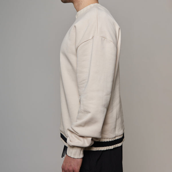 side view of nude crewneck